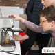 Emily Rosenberg of Stumptown Coffee’s education team pulls a shot with the Infuser.